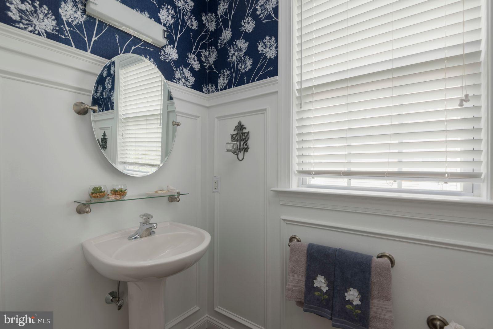 882 Shavertown Road Garnet Valley, PA 19060 - Photo 9 of 33 Charming half-bath with floral accents.