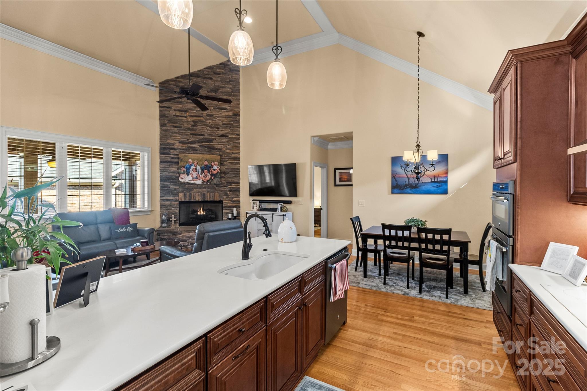 6197 Gold Springs Way Denver, NC 28037 - Photo 11 of 47 a kitchen with counter top space appliances and furniture