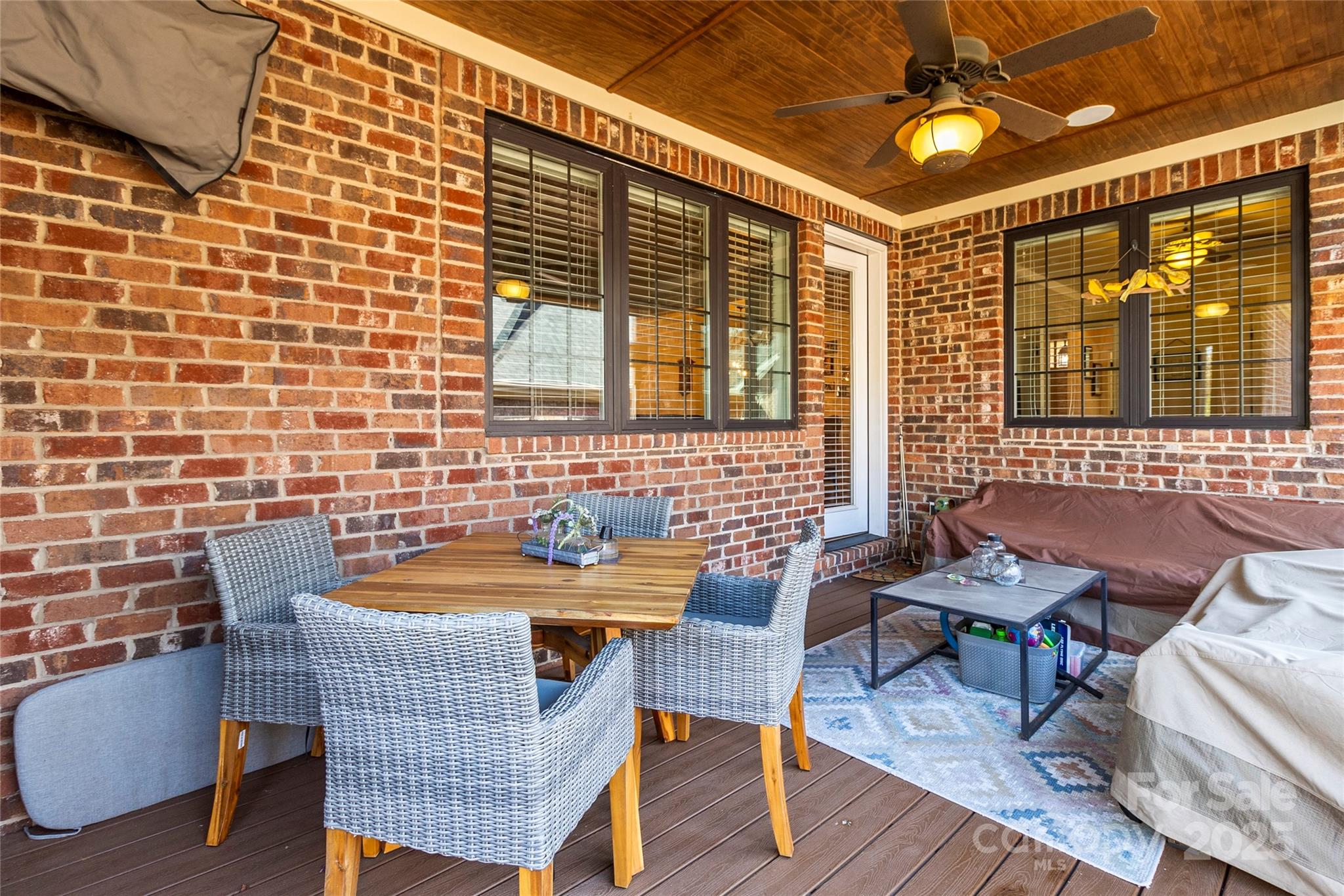 6197 Gold Springs Way Denver, NC 28037 - Photo 33 of 47 a outdoor dining space with furniture and chandelier