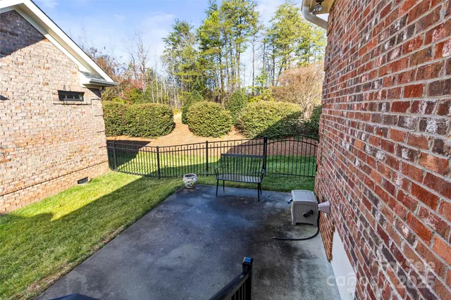 a view of a garden with a bench