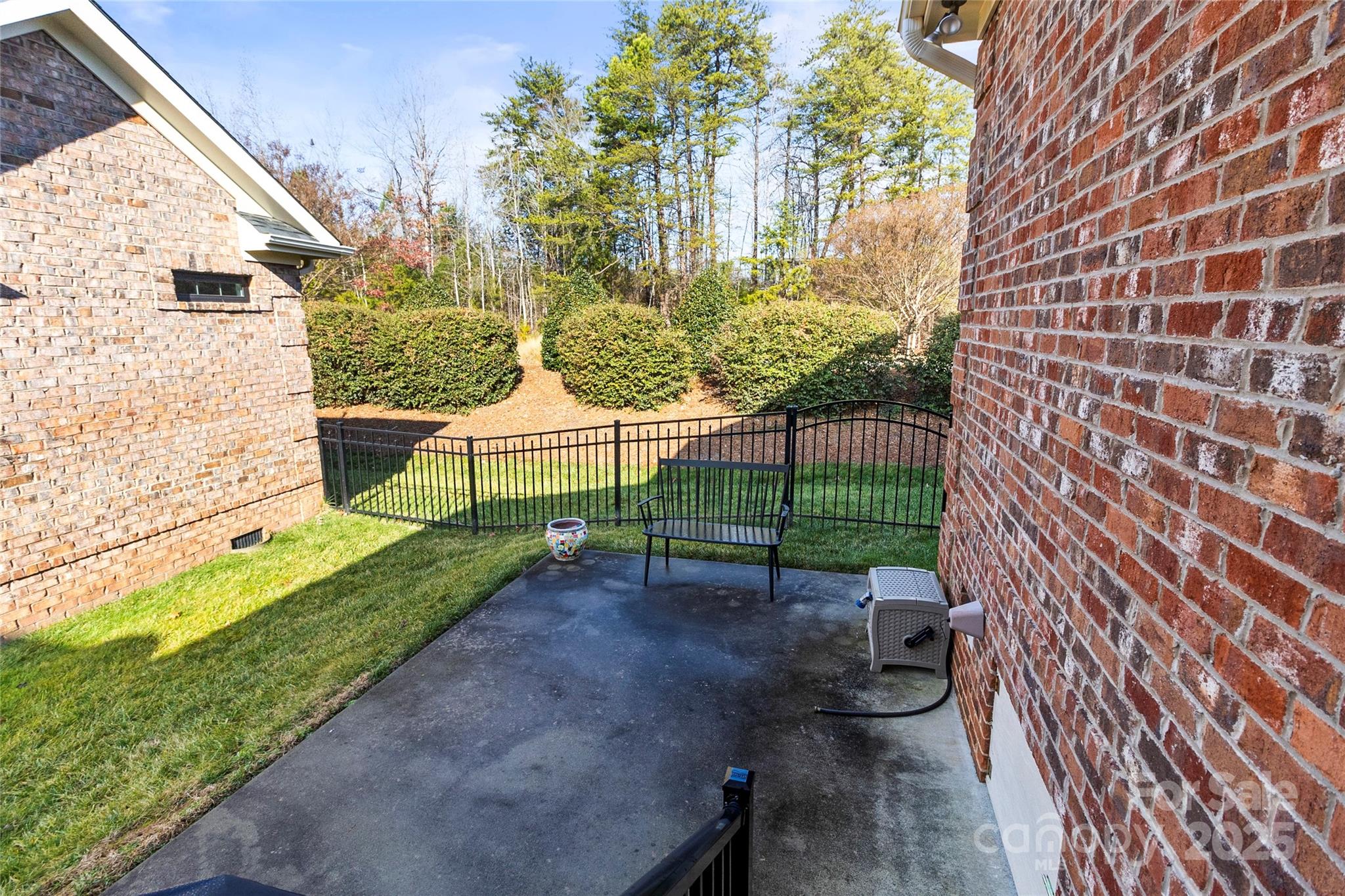 6197 Gold Springs Way Denver, NC 28037 - Photo 39 of 47 a view of a garden with a bench