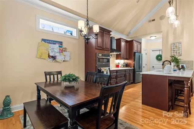 a view of a dining room with furniture