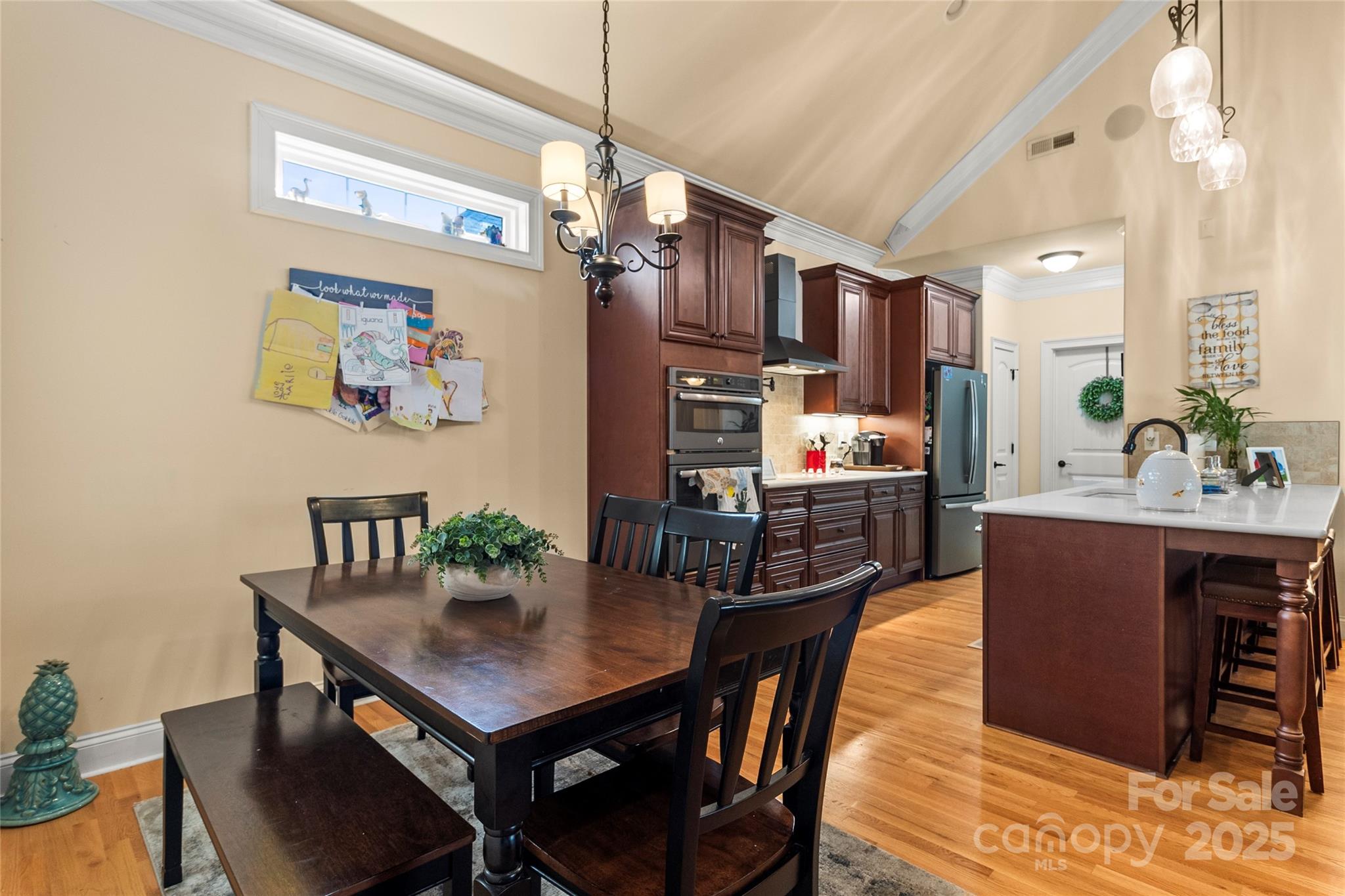 6197 Gold Springs Way Denver, NC 28037 - Photo 9 of 47 a view of a dining room with furniture