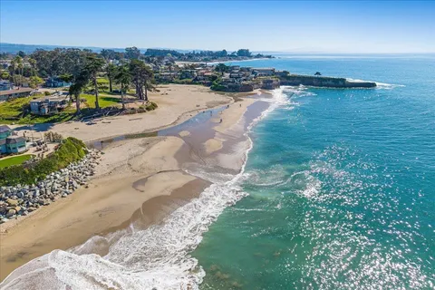 a view of a lake with multiple houses