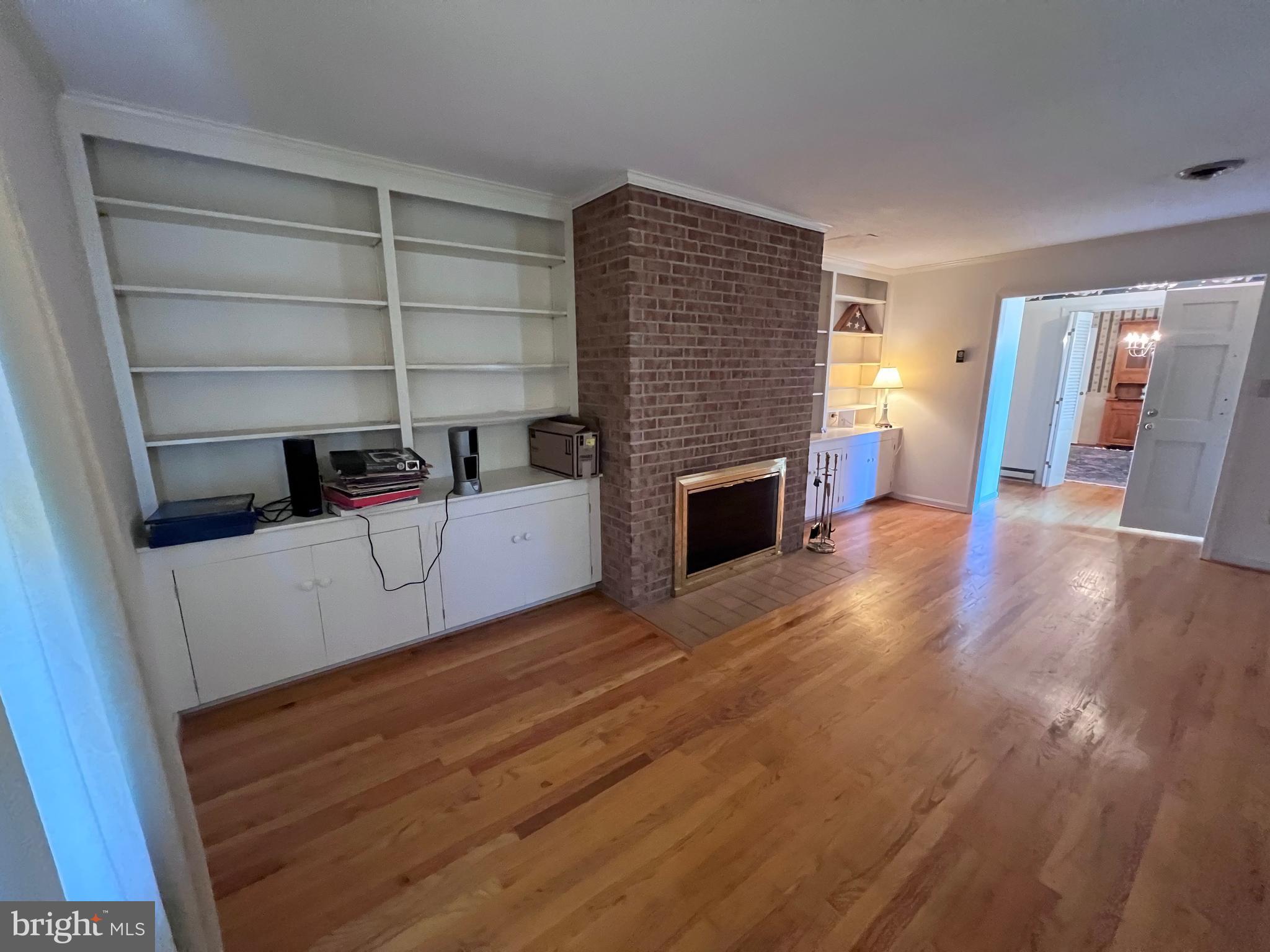 7119 Academy Road Warrenton, VA 20187 - Photo 14 of 21 a view of livingroom with furniture and fireplace