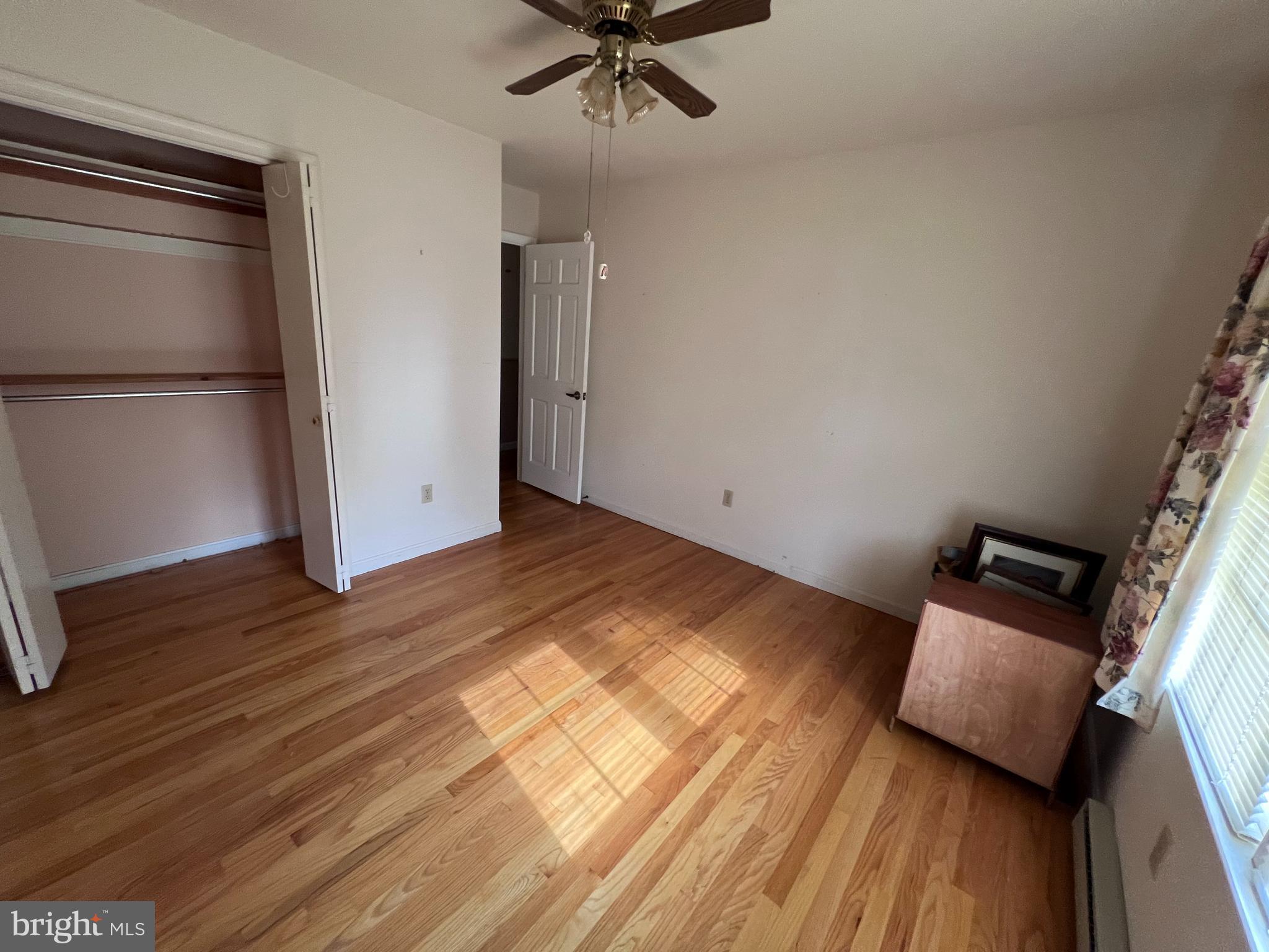 7119 Academy Road Warrenton, VA 20187 - Photo 8 of 21 a view of an empty room and wooden floor