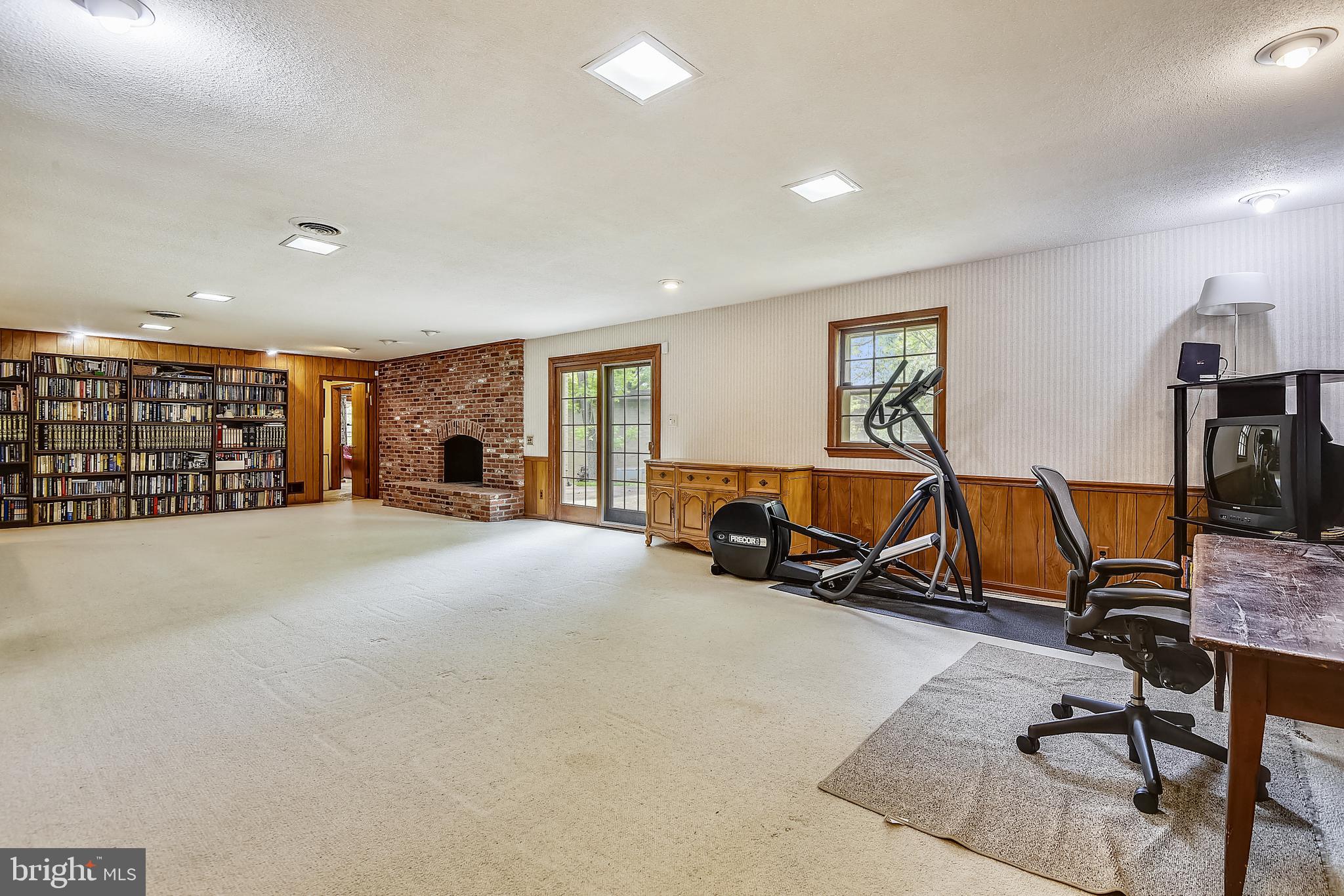 7200 Nevis Road Bethesda, MD 20817 - Photo 36 of 50 Brick Fireplace / Access to Backyard