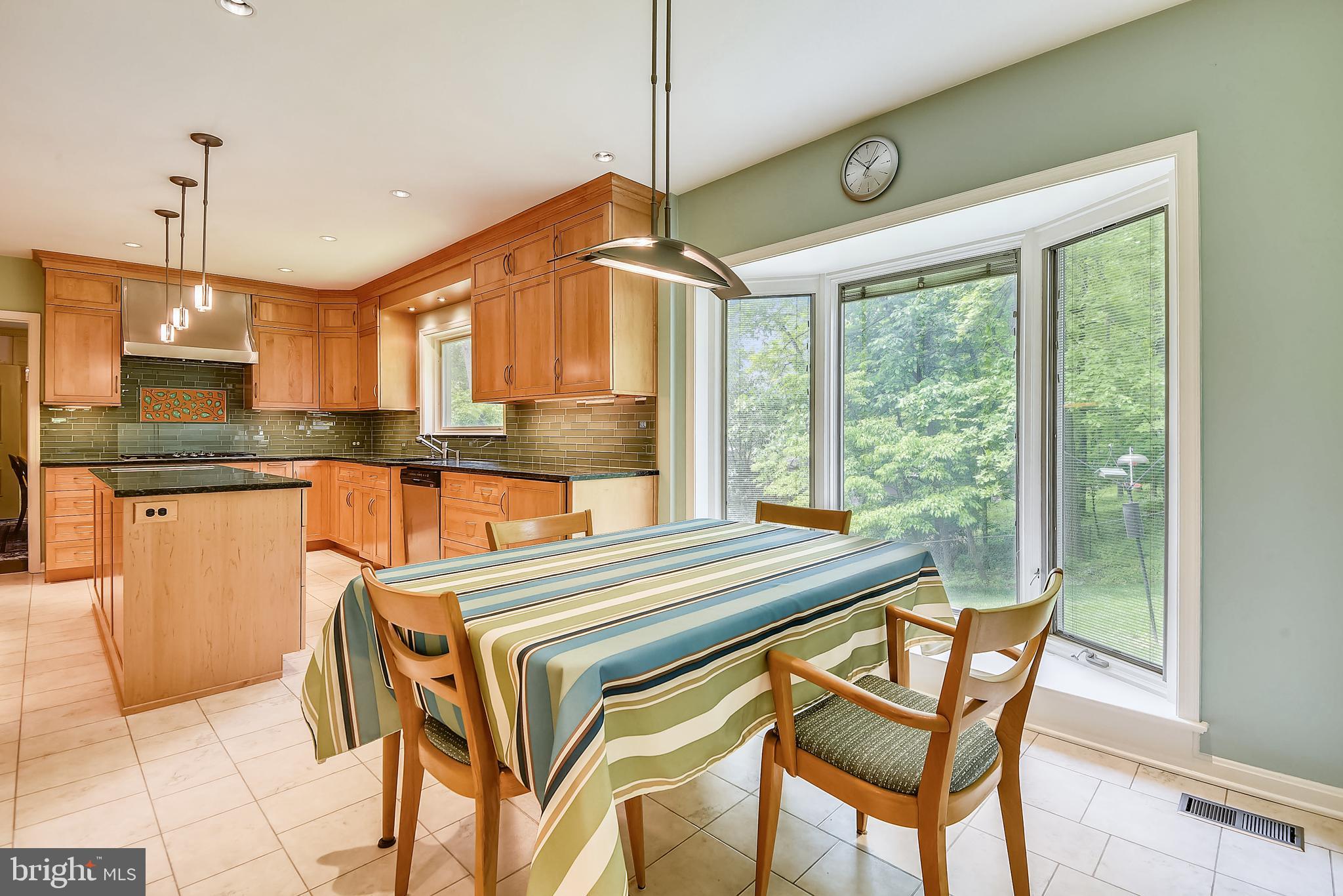 7200 Nevis Road Bethesda, MD 20817 - Photo 7 of 50 Sun-Filled Breakfast Room Opens to Kitchen