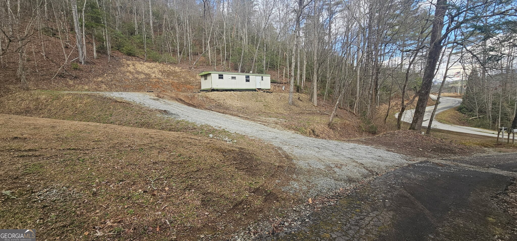6159 Wolffork Road Rabun Gap, GA 30568 - Photo 1 of 16 New homesite area. Mobile home put for temporary accomodations