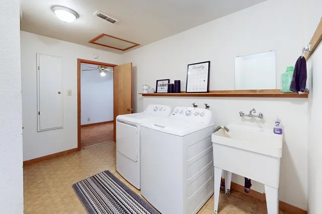 a utility room with dryer and washer