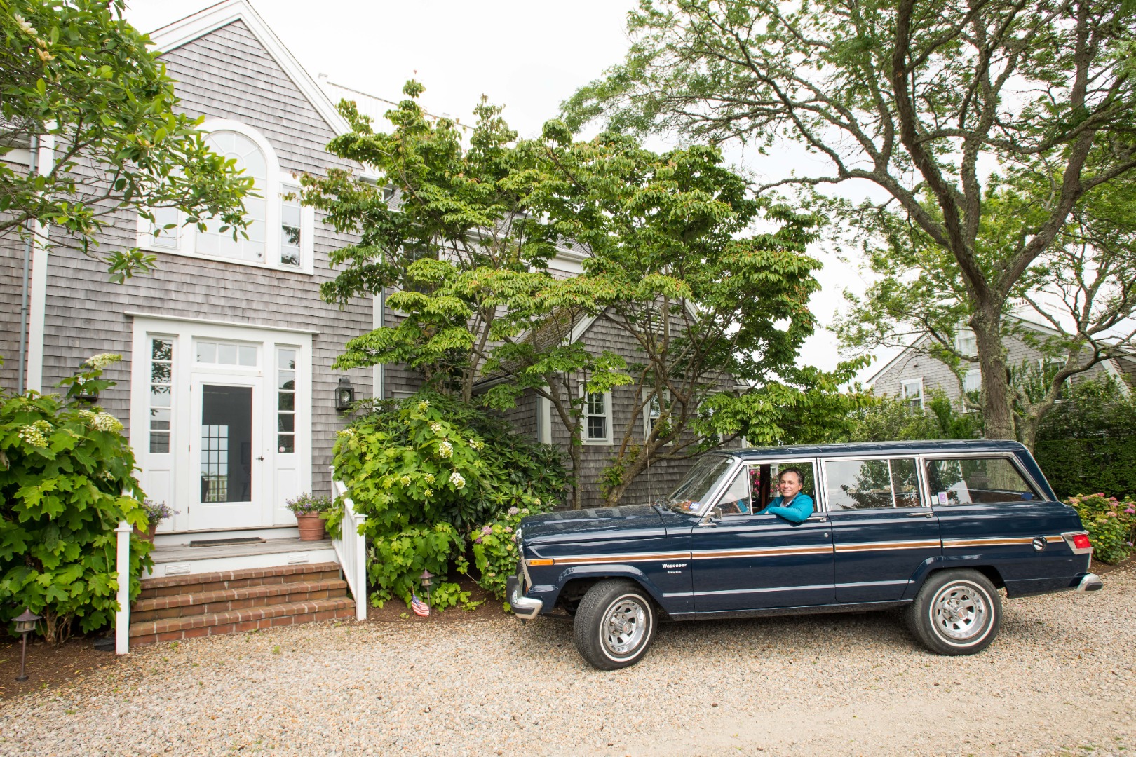 33 Cliff Road Nantucket, MA 02554 - Photo 64 of 84 a car parked in front of a house