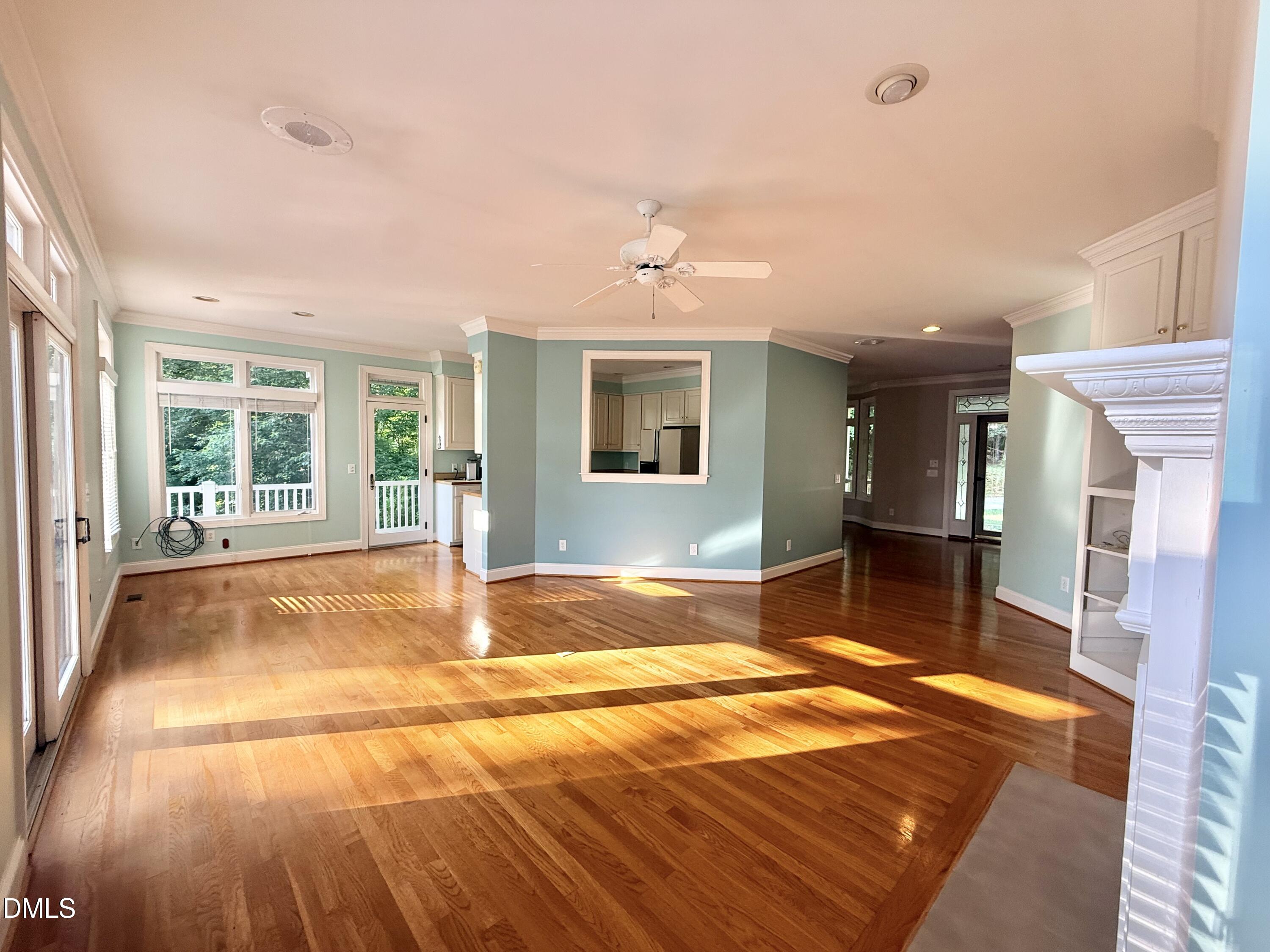 81 Beaver Crossing Road Roxboro, NC 27574 - Photo 8 of 80 a view of a livingroom with furniture wooden floor and a window