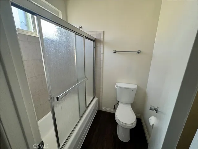 a bathroom with a toilet and a sink