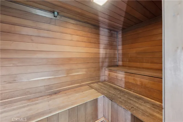 a bathroom with a shower and a sink