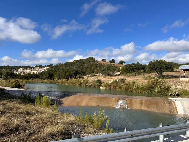 a view of a lake with a city