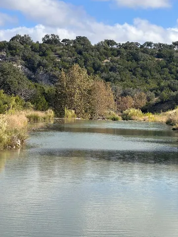 a view of lake with mountain
