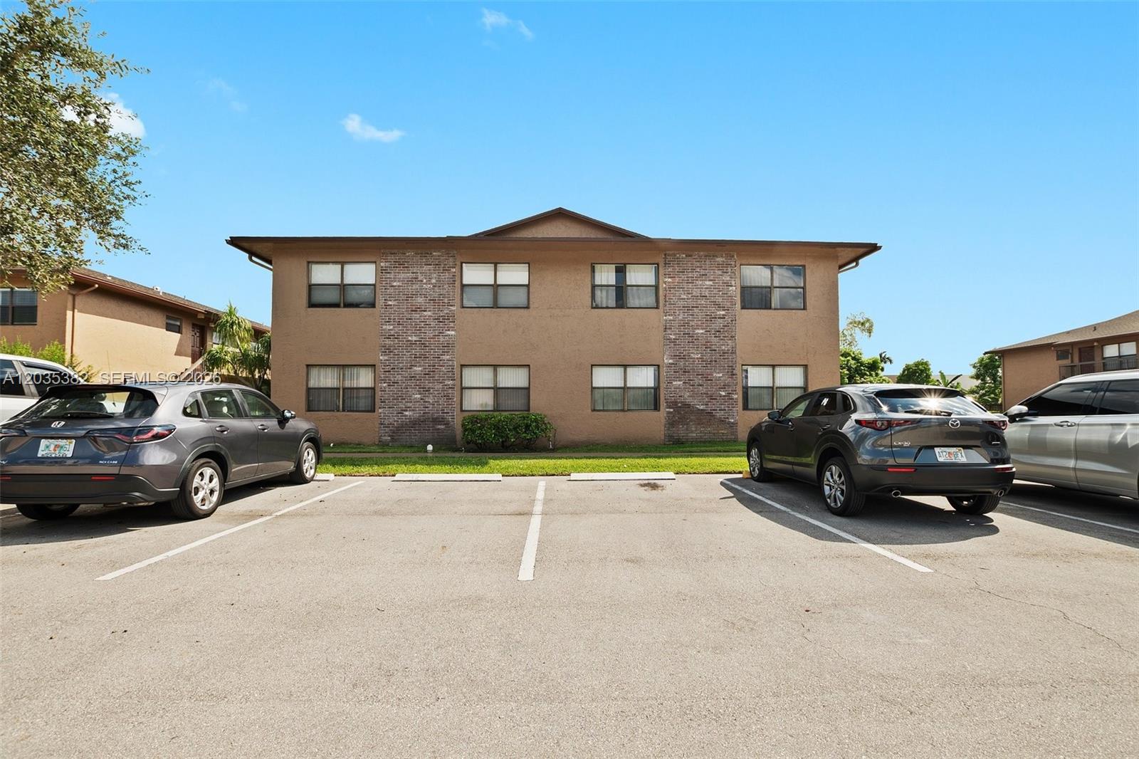 10053 Winding Lake Road, Unit 101 Sunrise, FL 33351 - Photo 1 of 24