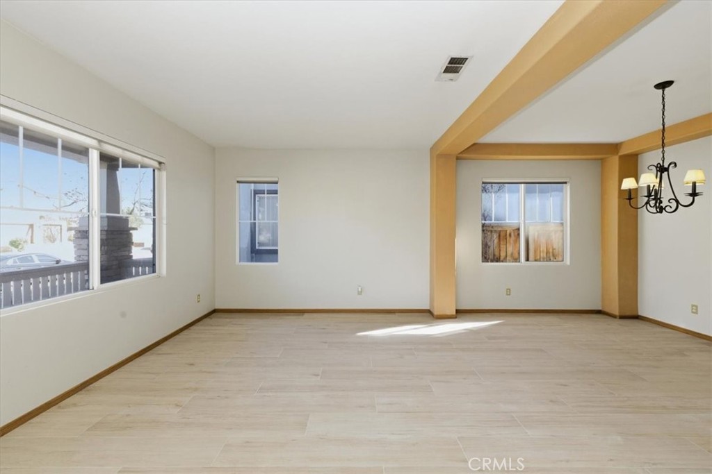 13747 Robinbrook Court Eastvale, CA 92880 - Photo 14 of 50 a view of an empty room with a window