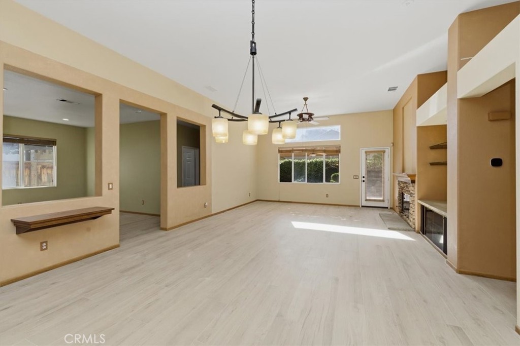 13747 Robinbrook Court Eastvale, CA 92880 - Photo 25 of 50 a view of a livingroom with a staircase