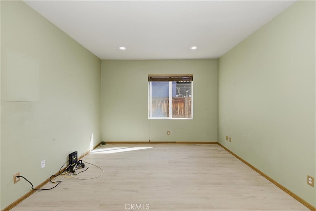 13747 Robinbrook Court Eastvale, CA 92880 - Photo 28 of 50 an empty room with windows
