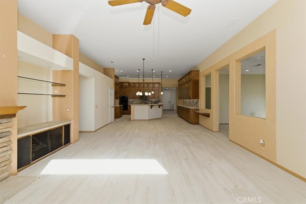 13747 Robinbrook Court Eastvale, CA 92880 - Photo 30 of 50 a view of a kitchen with furniture and a kitchen view