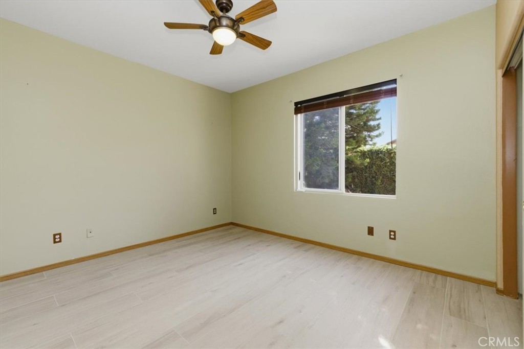 13747 Robinbrook Court Eastvale, CA 92880 - Photo 33 of 50 a view of an empty room with a window