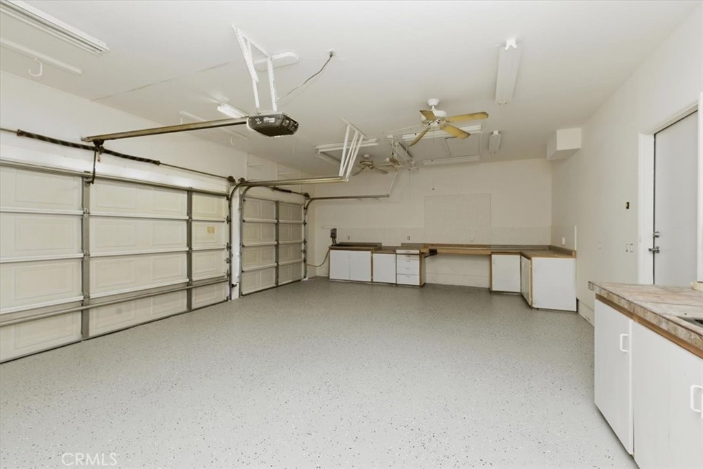 13747 Robinbrook Court Eastvale, CA 92880 - Photo 41 of 50 a view of a livingroom with furniture and a ceiling fan