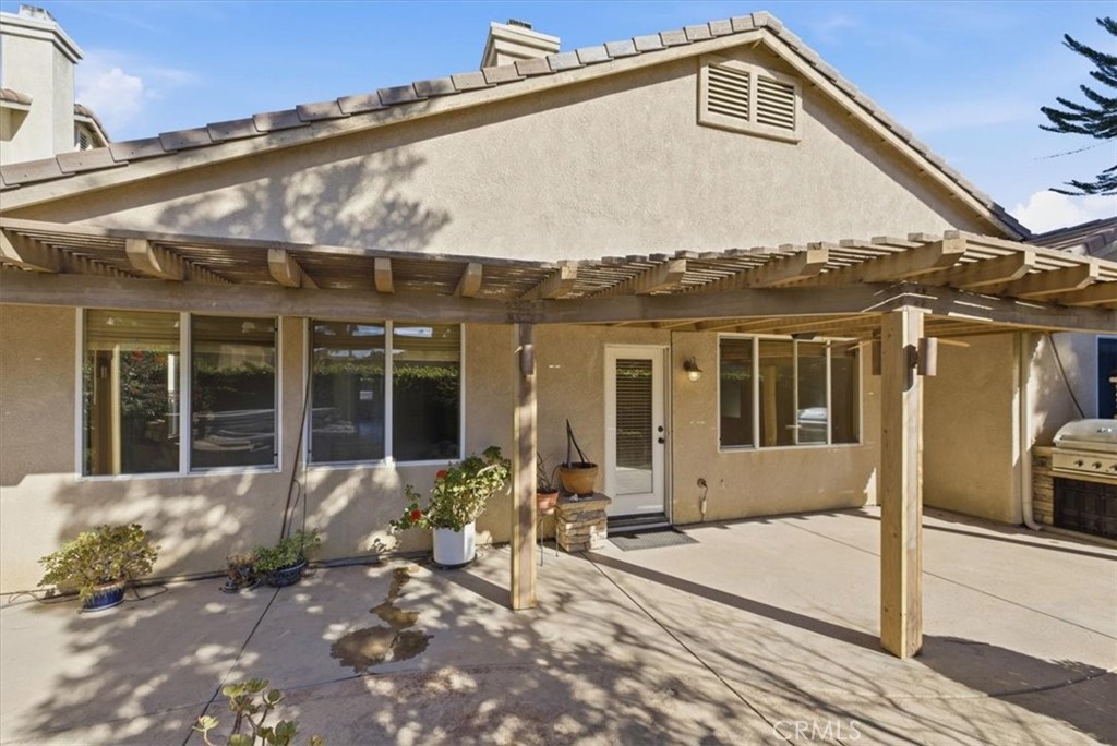 13747 Robinbrook Court Eastvale, CA 92880 - Photo 44 of 50 a front view of a house with a sitting area