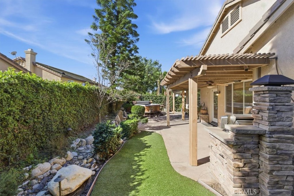 13747 Robinbrook Court Eastvale, CA 92880 - Photo 50 of 50 front view of a house with a yard