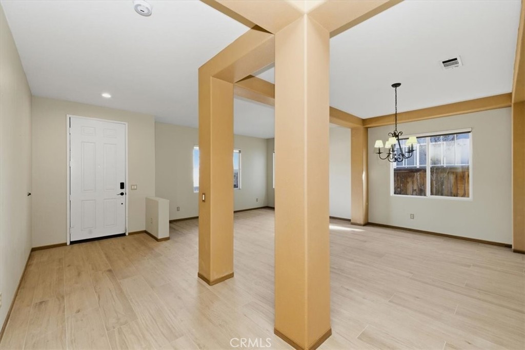 13747 Robinbrook Court Eastvale, CA 92880 - Photo 8 of 50 a view of a room with a flat screen tv