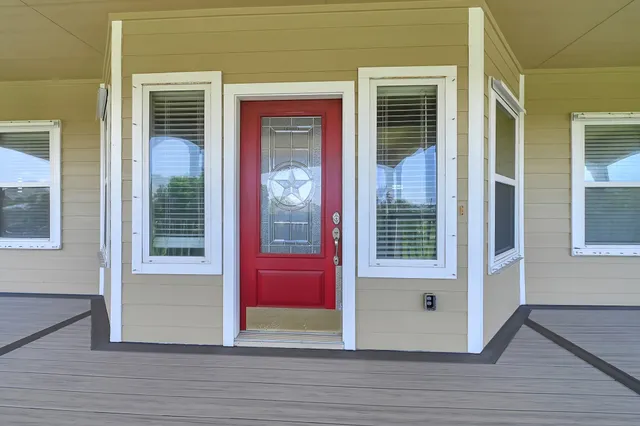 a view of a red door of the house