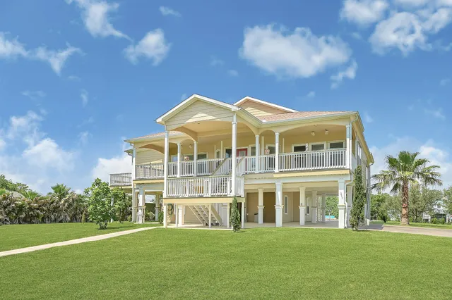 a view of a building with a yard