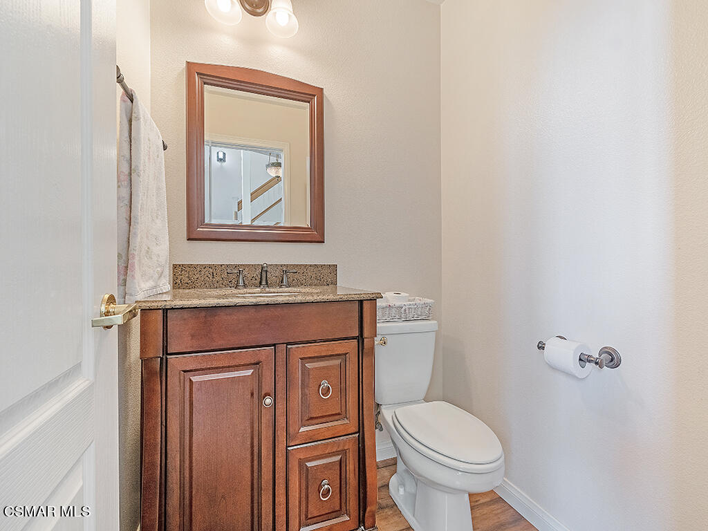 657 Cardinal Ridge Lane, Unit C Simi Valley, CA 93065 - Photo 14 of 53 a bathroom with a toilet and a sink
