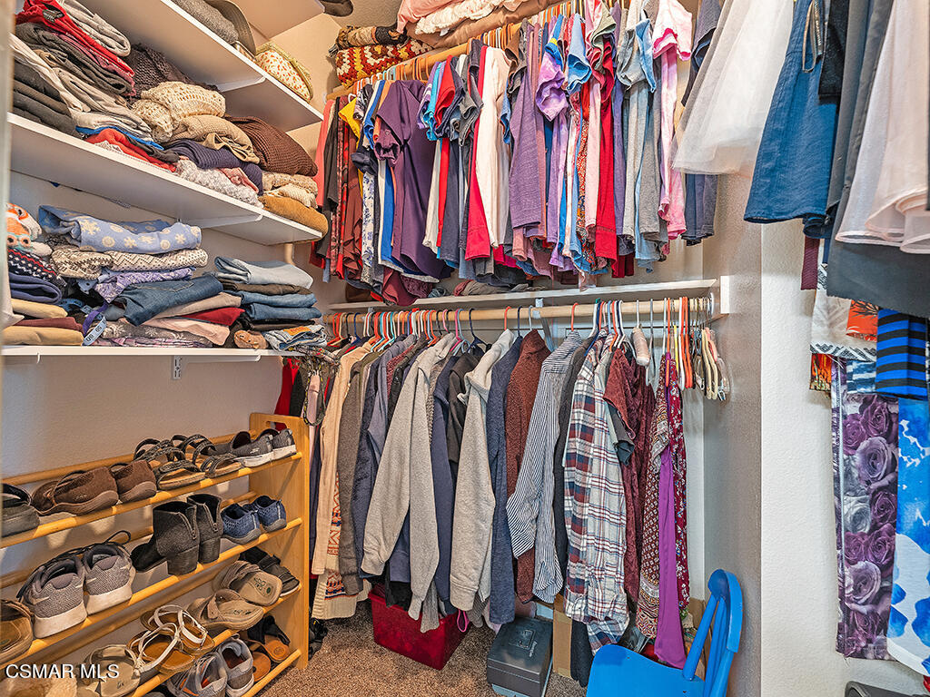 657 Cardinal Ridge Lane, Unit C Simi Valley, CA 93065 - Photo 36 of 53 a view of walk in closet with clothes and shoes
