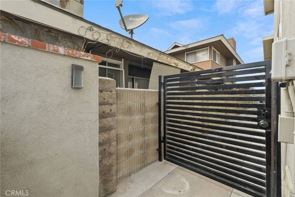 4941 Catamaran Street Oxnard, CA 93035 - Photo 32 of 72 Unit B gated entrance