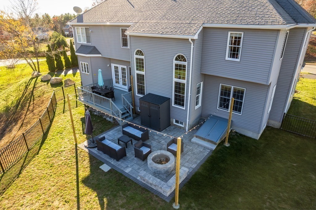 48 Mohawk Path Holliston, MA 01746 - Photo 34 of 41 a house with tall trees