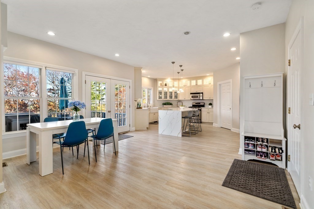 48 Mohawk Path Holliston, MA 01746 - Photo 9 of 41 a dining room with furniture and wooden floor