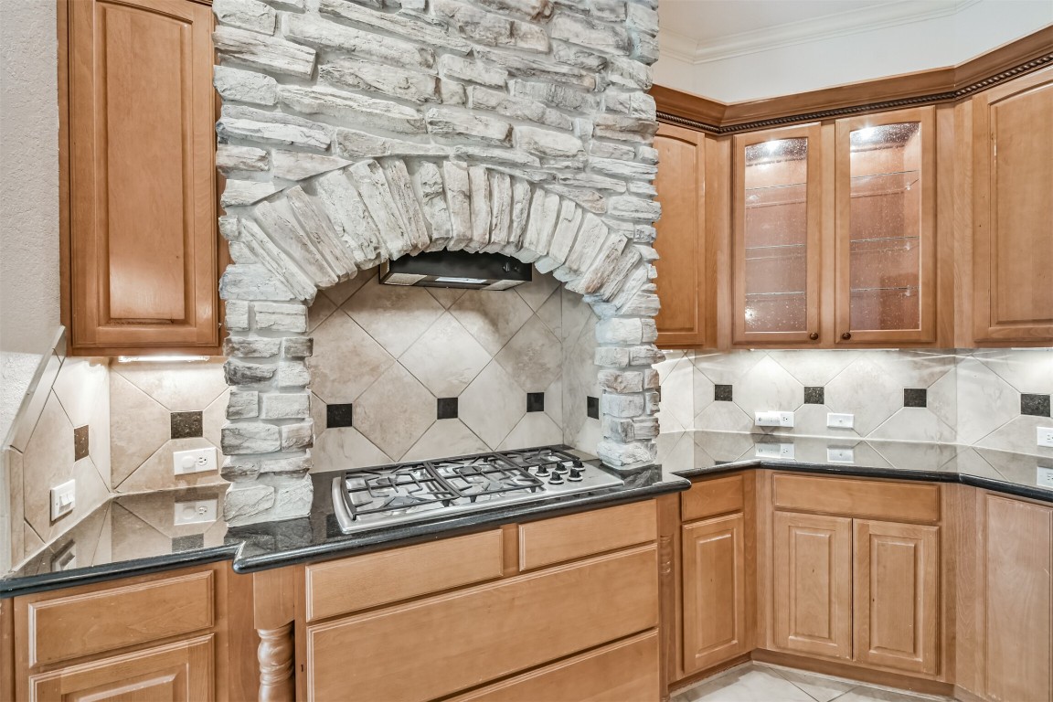 2 Sagestone Conroe, TX 77304 - Photo 14 of 50 a kitchen with stainless steel appliances a sink a stove and cabinets