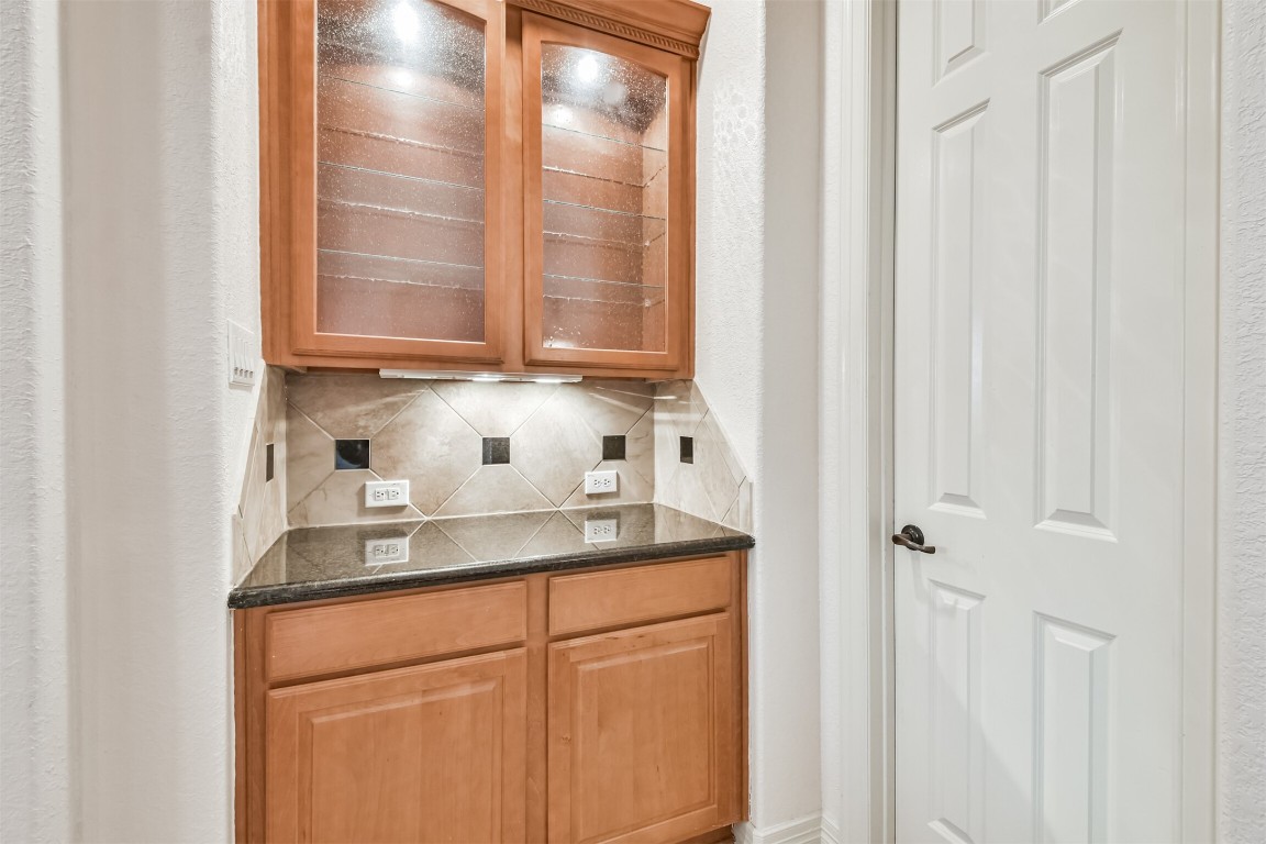 2 Sagestone Conroe, TX 77304 - Photo 20 of 50 a kitchen with stainless steel appliances granite countertop white cabinets and a sink