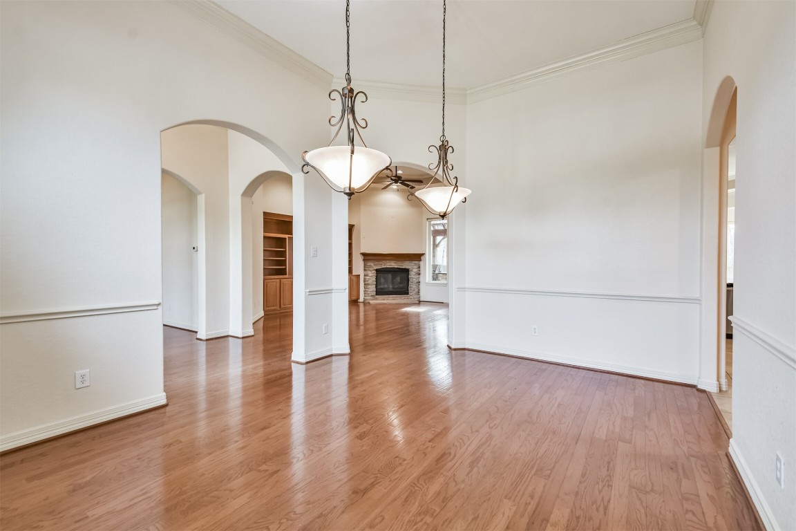 2 Sagestone Conroe, TX 77304 - Photo 21 of 50 a view of a room with wooden floor and a ceiling fan