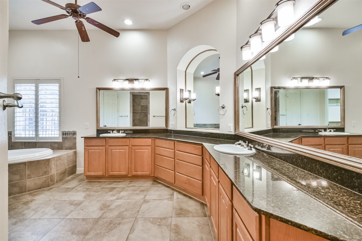 2 Sagestone Conroe, TX 77304 - Photo 27 of 50 a large kitchen with a large counter top and sink
