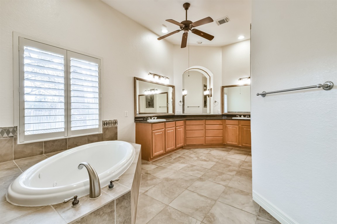 2 Sagestone Conroe, TX 77304 - Photo 30 of 50 a large white kitchen with a large window