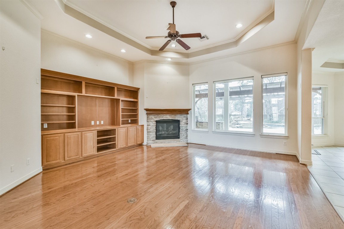 2 Sagestone Conroe, TX 77304 - Photo 5 of 50 a view of an empty room with a window and fireplace