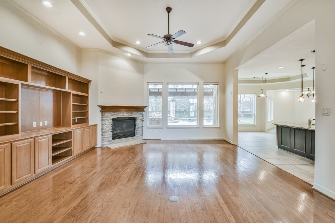 2 Sagestone Conroe, TX 77304 - Photo 9 of 50 a view of an empty room with a fireplace and a window
