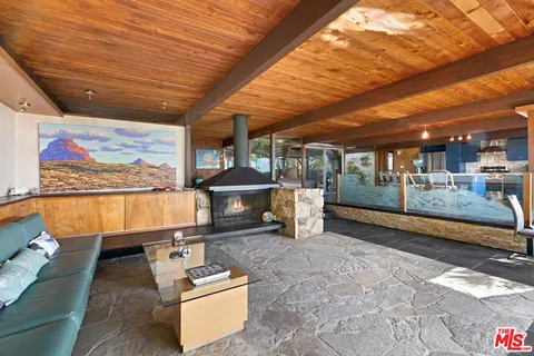 a view of dining room with lots of furniture and wooden floor