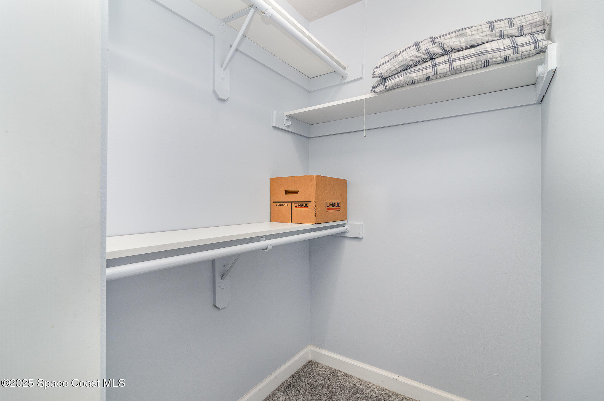 1303 Whitehurst Road Southwest Palm Bay, FL 32908 - Photo 14 of 22 Primary Walk-In Closet