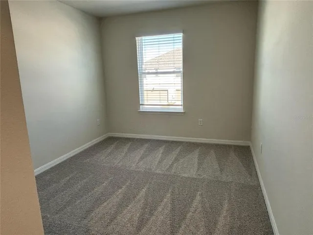 an empty room with a window