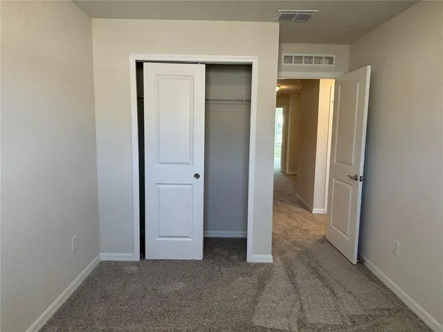 an empty room with closet