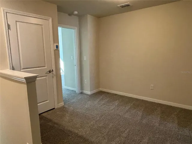 an empty room with closet
