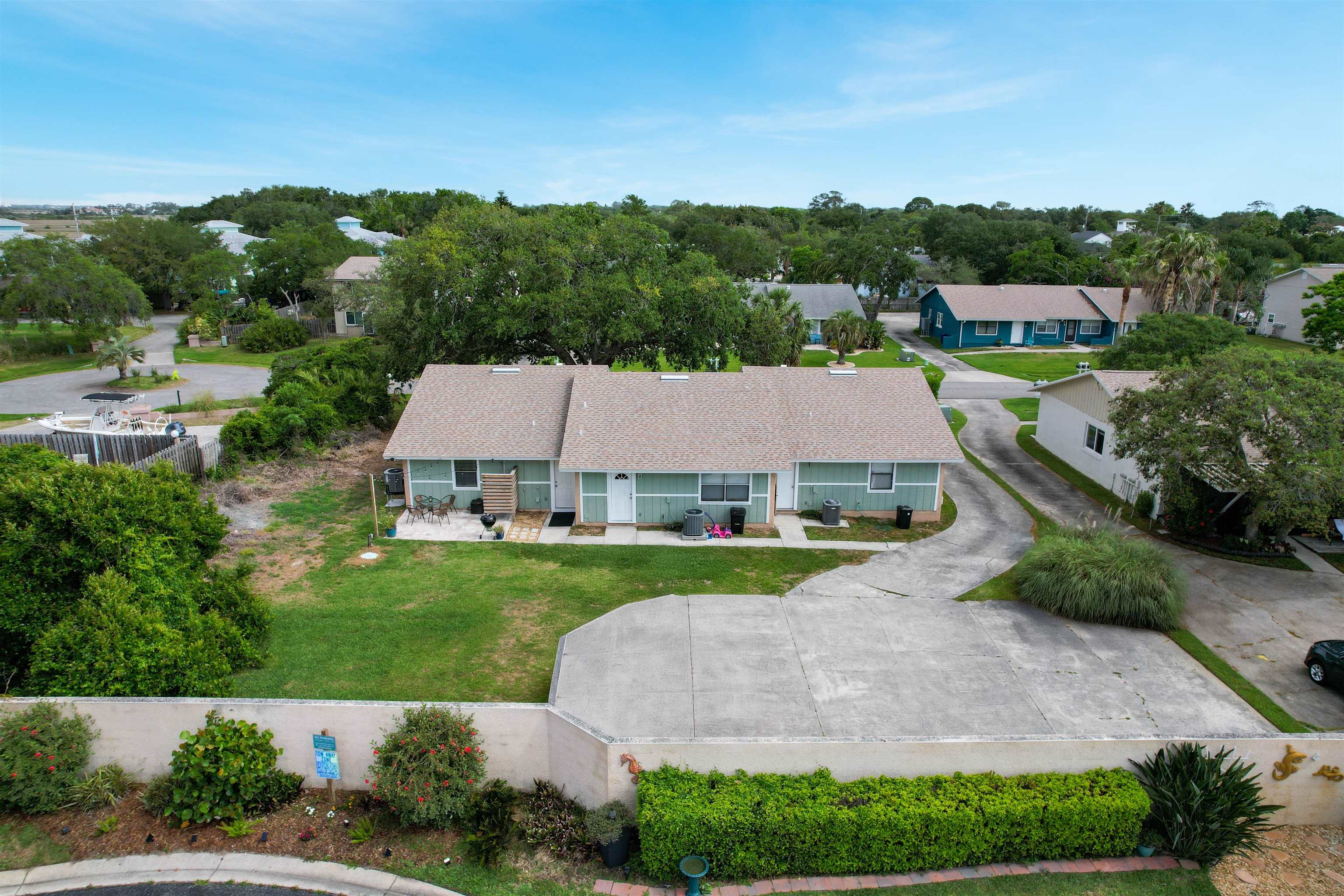 129 Rio Del Mar Street, Unit C St. Augustine, FL 32080 - Photo 25 of 26 a aerial view of a house with a garden